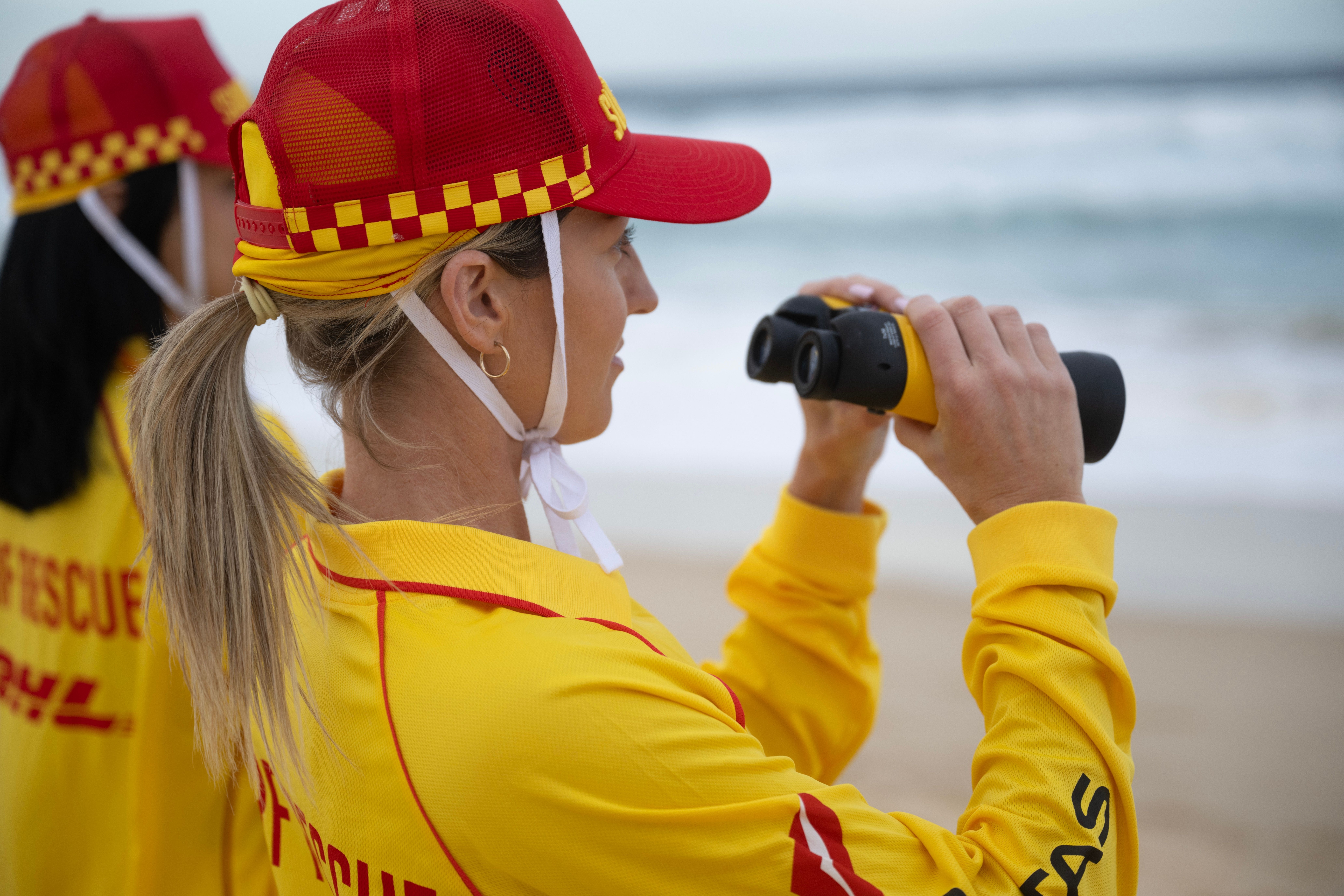 Surf Life Saver With Binoculars